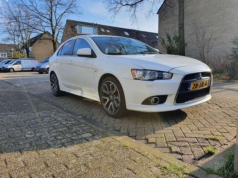 Wit Gebruikt 2009 Mitsubishi Lancer Instyle Hatchback | € 4.999 (Super prijs) - Afbeelding 1/4