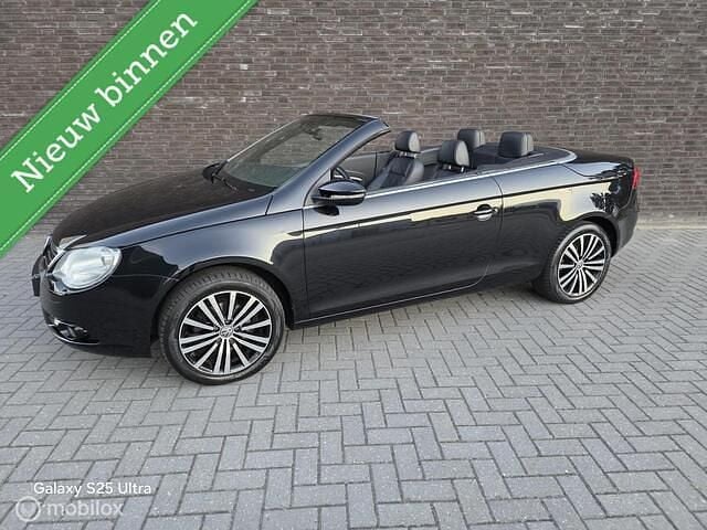 Zwart Gebruikt 2009 VW Eos Highline Cabriolet | € 7.499 (Eerlijke prijs) - Afbeelding 1/4