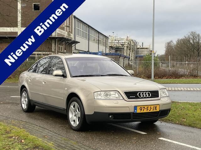 Beige, metallic lak Gebruikt 2000 Audi A6 Ambiente Sedan | € 9.999 - Afbeelding 1/4