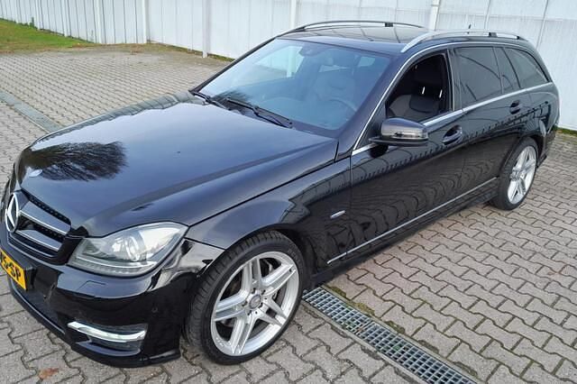 Zwart (metallic) Occasion 2011 Mercedes C350 Elegance Stationwagen | € 13.500 (Eerlijke prijs) - Afbeelding 1/4