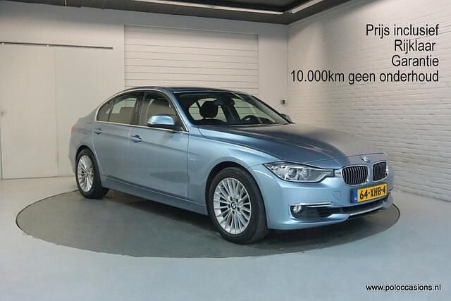 Blauw Gebruikt 2012 BMW 320 Executive Sedan | € 12.800 (Eerlijke prijs) - Afbeelding 1/4