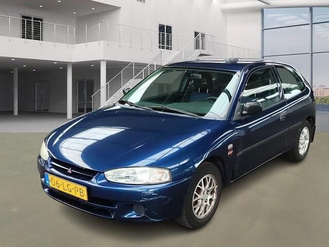 Blauw Gebruikt 2003 Mitsubishi Colt Hatchback | € 995 (Super prijs) - Afbeelding 1/4