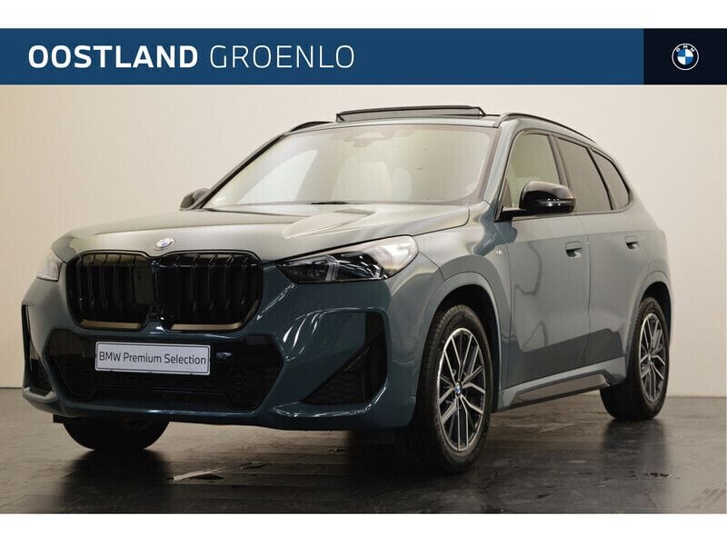 Groen Gebruikt 2024 BMW X1 Executive SUV | € 54.950 - Afbeelding 1/4