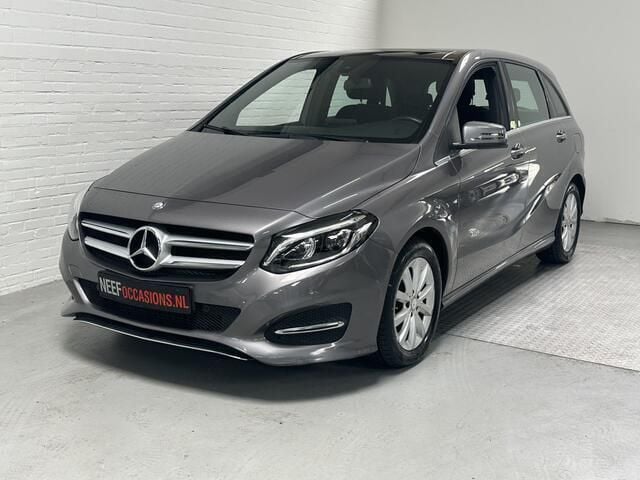 Grijs Gebruikt 2016 Mercedes B180 Prestige MPV | € 13.499 (Eerlijke prijs) - Afbeelding 1/4