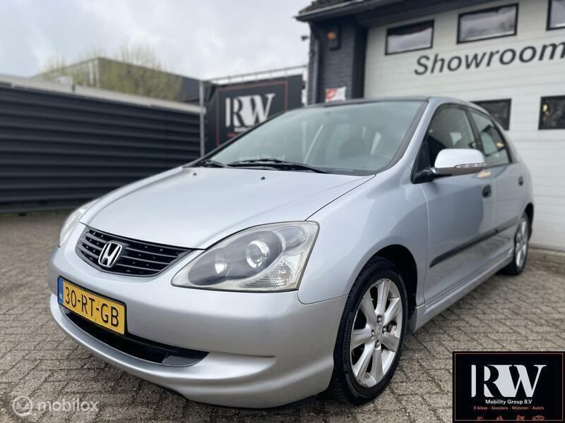 Grijs Gebruikt 2005 Honda Civic LS Hatchback | € 1.495 (Eerlijke prijs) - Afbeelding 1/4