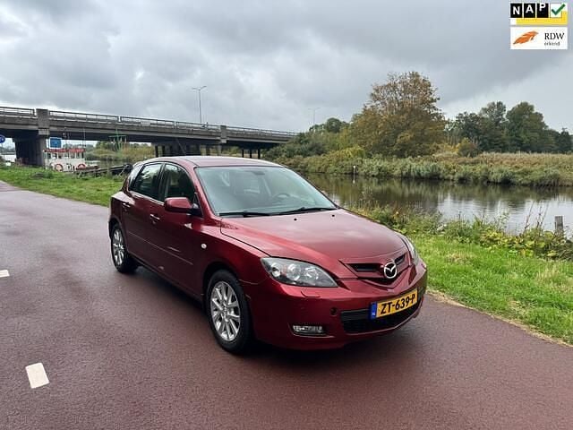 Rood Gebruikt 2009 Mazda 3 Sense Hatchback | € 2.350 (Super prijs) - Afbeelding 1/4