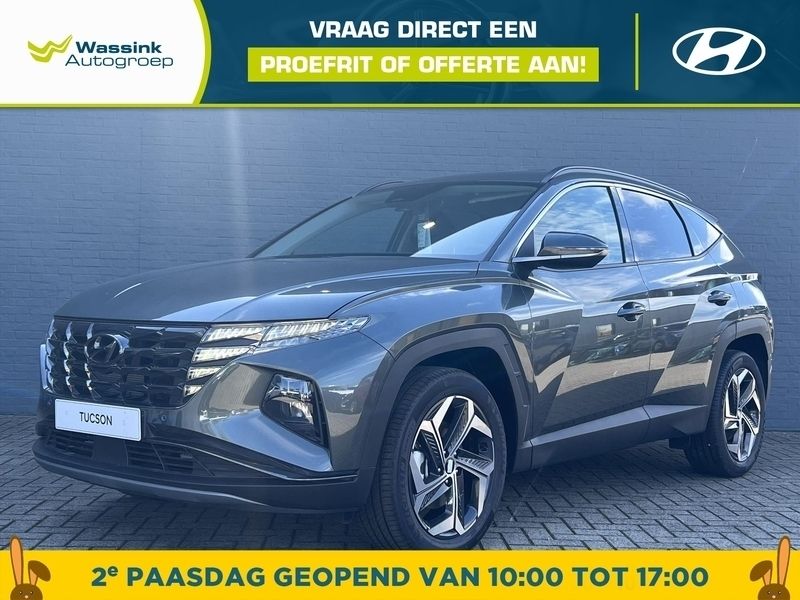Ecotronic gray (grijs metallic) Nieuw 2025 Hyundai Tucson Premium SUV | € 47.867 (Iets duurder) - Afbeelding 1/4