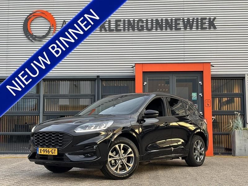 Zwart (metallic) Gebruikt 2023 Ford Kuga ST-Line SUV | € 29.950 (Eerlijke prijs) - Afbeelding 1/4