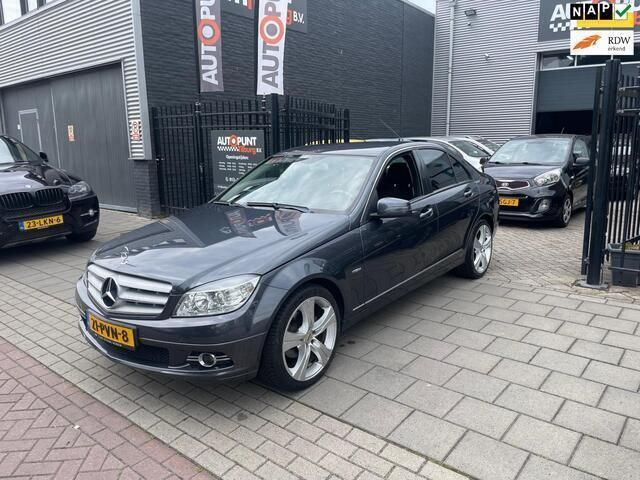 Grijs Gebruikt 2010 Mercedes C180 Sedan | € 7.999 (Goede deal) - Afbeelding 1/4
