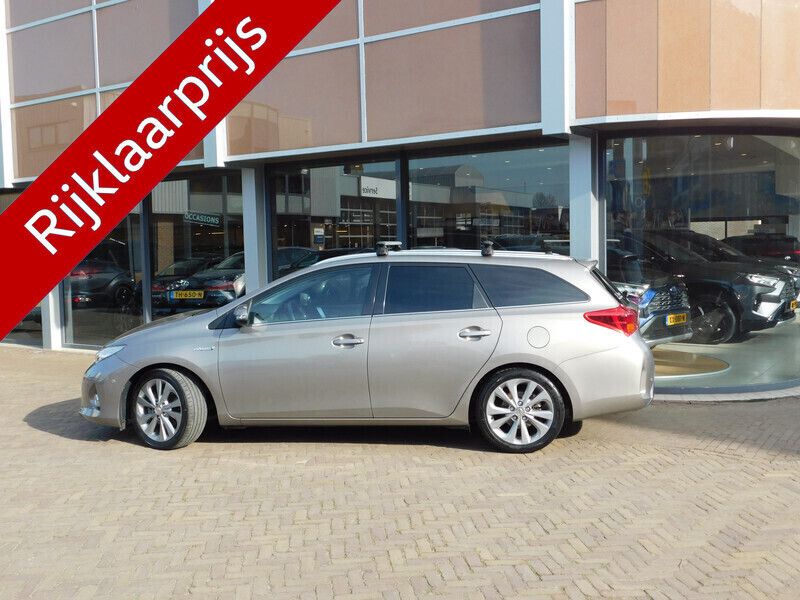 Grijs Gebruikt 2013 Toyota Auris Hybrid Executive Stationwagen | € 14.900 (Eerlijke prijs) - Afbeelding 1/4