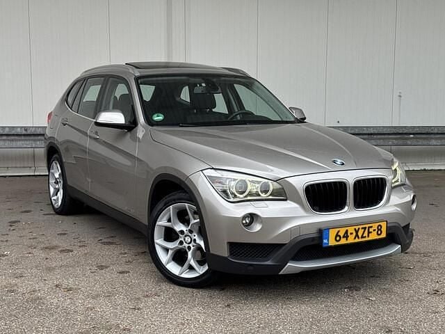Grijs Gebruikt 2012 BMW X1 Sport Line SUV | € 12.750 (Eerlijke prijs) - Afbeelding 1/4