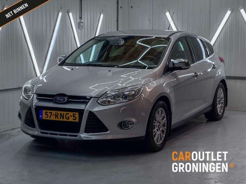 Grijs, metallic lak Gebruikt 2011 Ford Focus Titanium Hatchback | € 5.990 (Goede deal) - Afbeelding 1/4