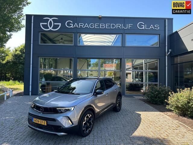 Grijs Gebruikt 2022 Opel Mokka Ultimate SUV | € 21.950 (Goede deal) - Afbeelding 1/4