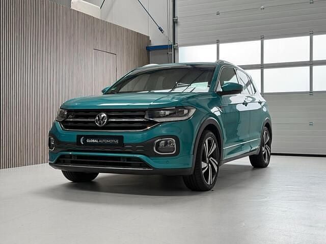 Groen, metallic lak Gebruikt 2019 VW T-Cross R-line SUV | € 20.990 (Iets duurder) - Afbeelding 1/4