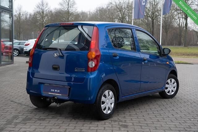 Occasion Daihatsu Cuore 69 PK (50 kW) 2008 Blauw Hatchback