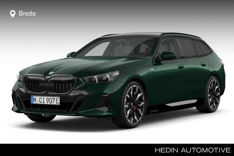 Groen Nieuw 2024 BMW 550e Comfort Edition Stationwagen | € 120.614 - Afbeelding 1/4