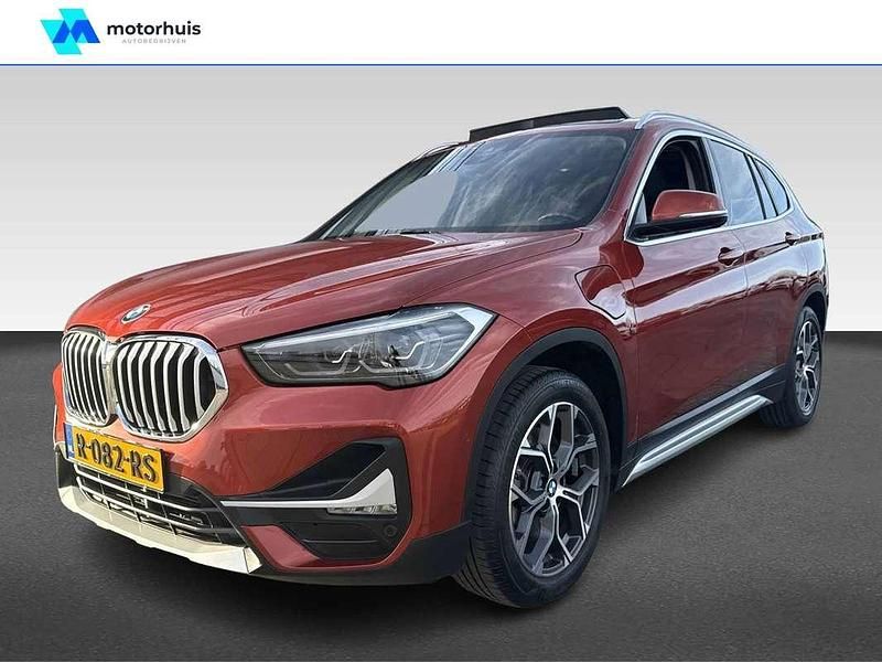 Oranje Gebruikt 2020 BMW X1 Basis SUV | € 24.970 (Eerlijke prijs) - Afbeelding 1/4
