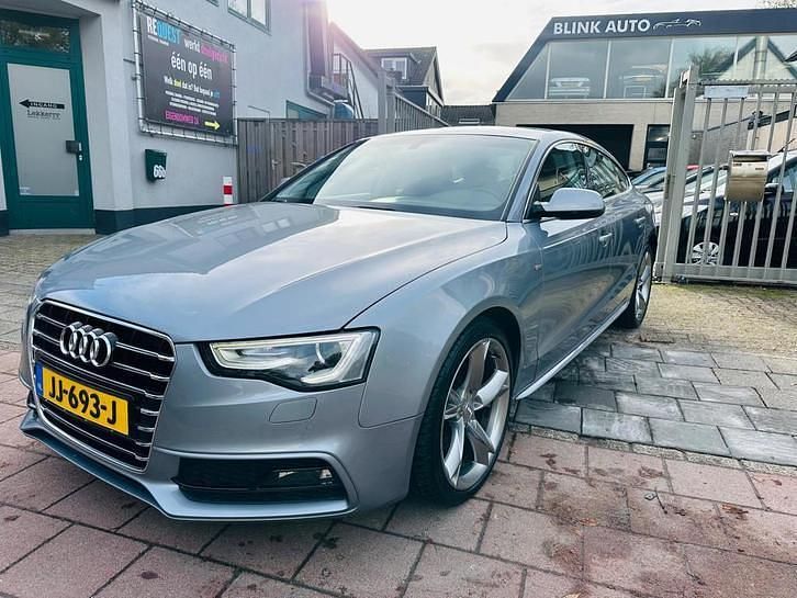 Grijs Occasion 2016 Audi A5 Sportback S-Line Hatchback | € 12.999 (Eerlijke prijs) - Afbeelding 1/4