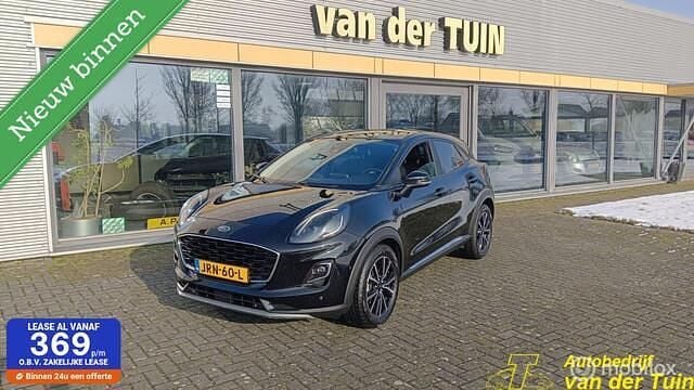 Zwart (metallic) Occasion 2023 Ford Puma Titanium SUV | € 22.800 (Eerlijke prijs) - Afbeelding 1/4