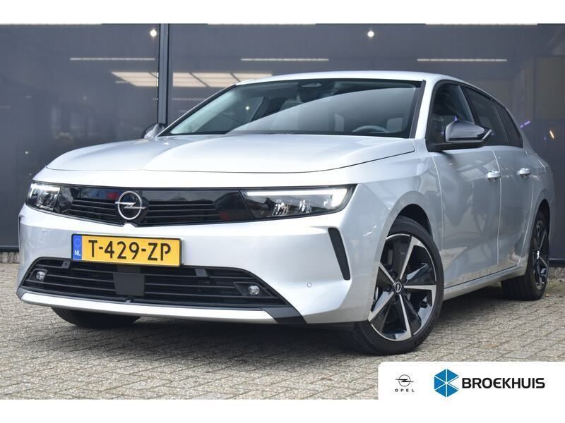 Grijs, metallic lak Gebruikt 2023 Opel Astra Stationwagen | € 28.900 - Afbeelding 1/4