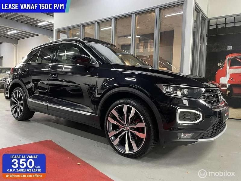 Zwart Gebruikt 2018 VW T-Roc SUV | € 21.650 (Goede deal) - Afbeelding 1/4