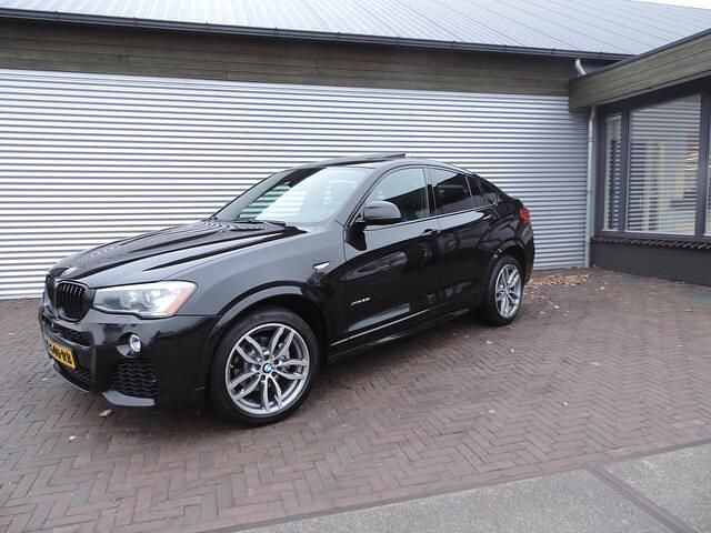 Zwart (metallic) Occasion 2015 BMW X4 Executive SUV | € 19.985 (Super prijs) - Afbeelding 1/4