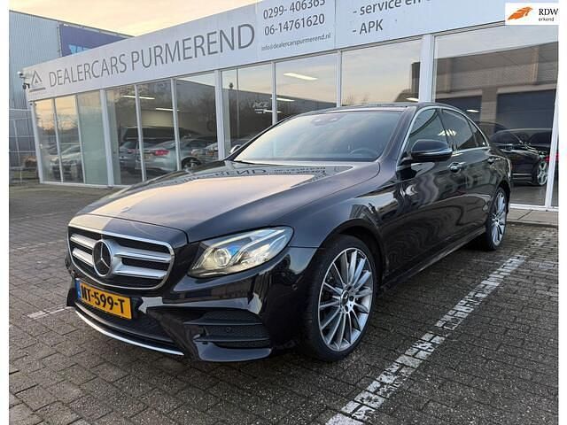 Zwart (metallic) Occasion 2016 Mercedes E350 Prestige Sedan | € 29.950 (Duur) - Afbeelding 1/4