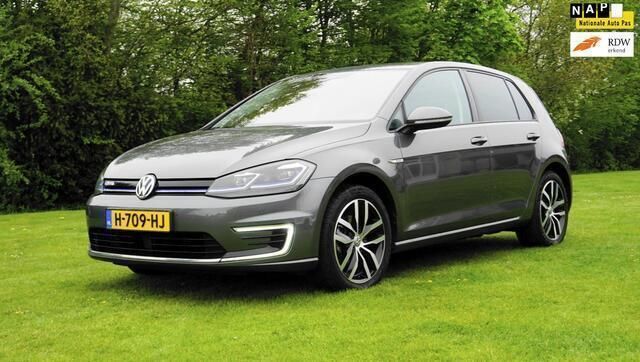 Grijs, metallic lak Gebruikt 2020 VW e-Golf Hatchback | € 12.500 (Eerlijke prijs) - Afbeelding 1/4