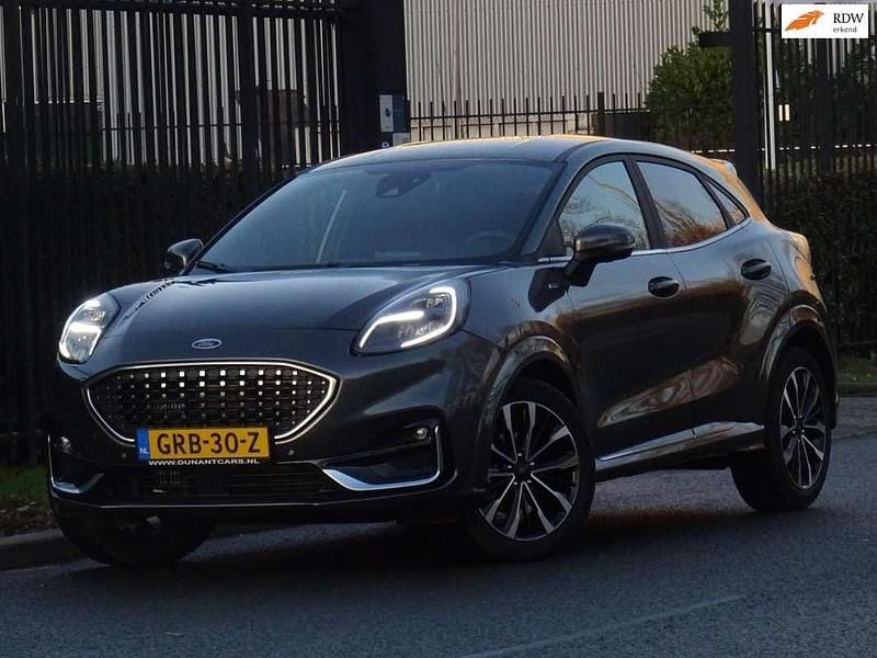 Grijs, metallic lak Gebruikt 2024 Ford Puma ST-Line MPV | € 27.499 (Eerlijke prijs) - Afbeelding 1/4