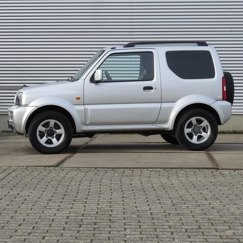 Occasion Suzuki Jimny Exclusive 86 PK (63 kW) 2011 Grijs SUV