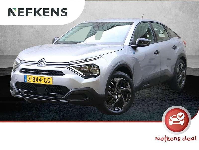 Grijs Gebruikt 2024 Citroën e-C4 SUV | € 20.425 (Eerlijke prijs) - Afbeelding 1/4