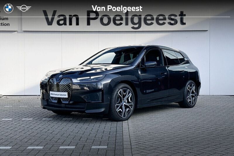 Grijs, metallic lak Gebruikt 2023 BMW iX Executive SUV | € 69.899 (Super prijs) - Afbeelding 1/4
