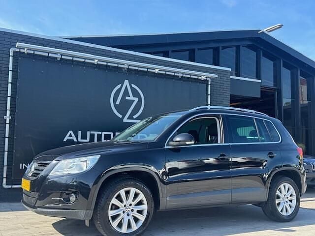 Zwart Gebruikt 2010 VW Tiguan Sport SUV | € 6.950 (Goede deal) - Afbeelding 1/4