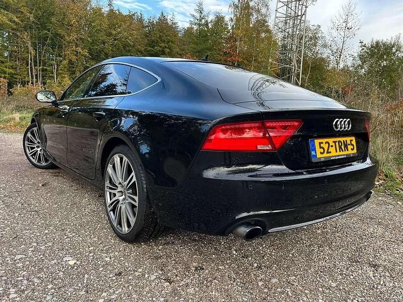 Zwart Gebruikt 2012 Audi A7 Hatchback | € 15.995 (Eerlijke prijs) - Afbeelding 1/4