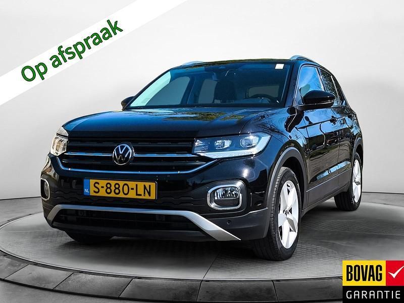 Zwart Gebruikt 2023 VW T-Cross Style SUV | € 23.900 (Eerlijke prijs) - Afbeelding 1/4