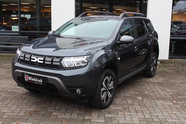 Grijs Gebruikt 2023 Dacia Duster Journey SUV | € 20.900 (Eerlijke prijs) - Afbeelding 1/4
