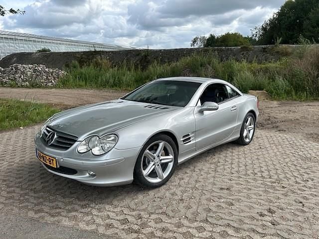 Grijs, metallic lak Gebruikt 2001 Mercedes SL500 Cabriolet | € 18.950 (Iets duurder) - Afbeelding 1/4