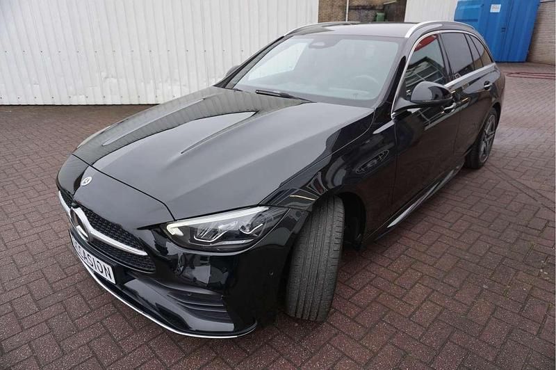 Occasion Mercedes C300e AMG line 2022 Zwart Stationwagen