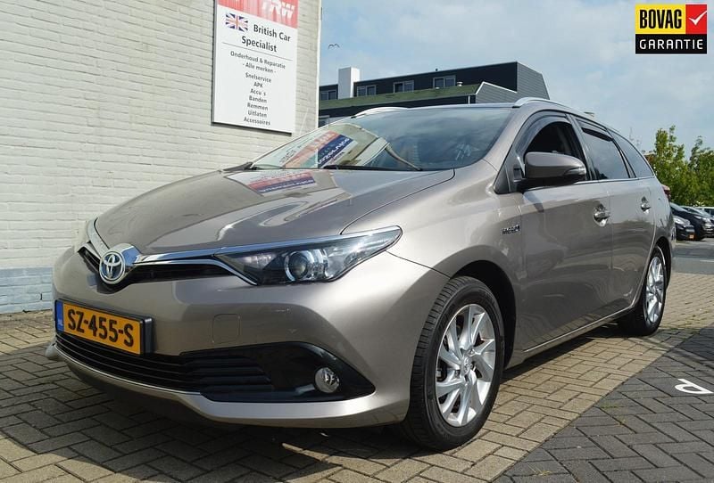 Grijs Gebruikt 2016 Toyota Auris Hybrid Stationwagen | € 16.450 (Eerlijke prijs) - Afbeelding 1/4