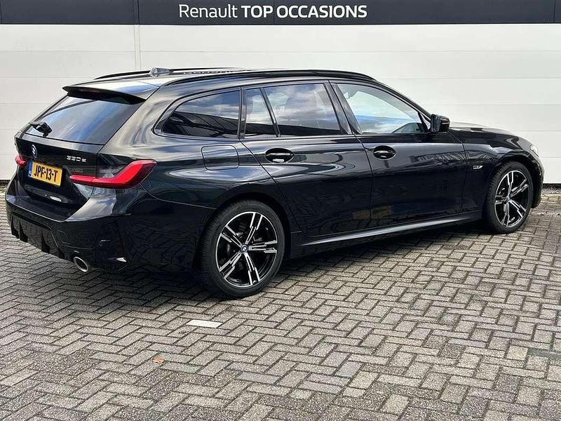 Occasion BMW 330e Executive 292 PK (214 kW) 2023 Zwart Stationwagen