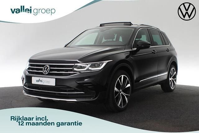 Zwart Gebruikt 2021 VW Tiguan Elegance SUV | € 32.700 (Eerlijke prijs) - Afbeelding 1/4