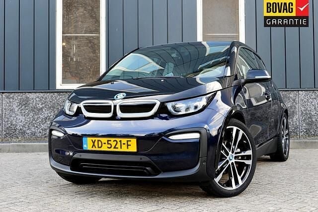 Blauw, metallic lak Gebruikt 2018 BMW i3 Basis Hatchback | € 14.950 (Eerlijke prijs) - Afbeelding 1/4