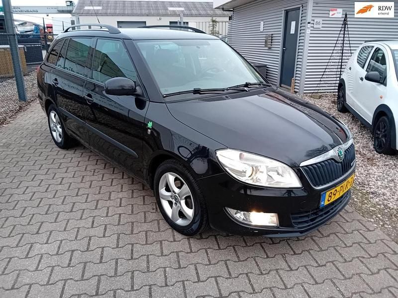 Zwart (metallic) Occasion 2011 Skoda Fabia GreenLine Stationwagen | € 999 (Super prijs) - Afbeelding 1/4