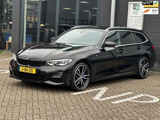 Zwart Gebruikt 2020 BMW 330 Executive Stationwagen | € 28.995 (Eerlijke prijs) - Afbeelding 1/4
