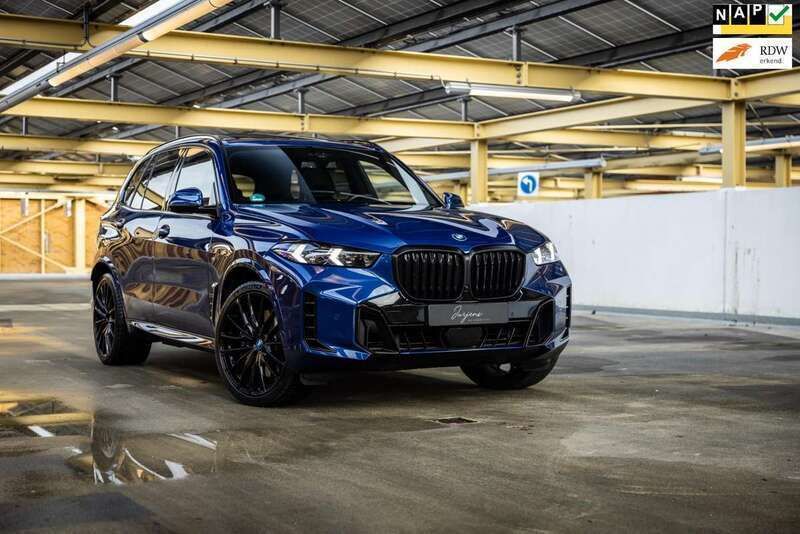 Blauw, metallic lak Gebruikt 2023 BMW X5 M Sport SUV | € 99.900 - Afbeelding 1/4