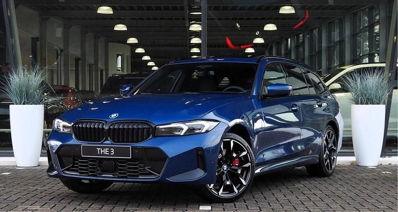 Grijs Nieuw 2025 BMW 330 Comfort Edition Stationwagen | € 78.964 - Afbeelding 1/4