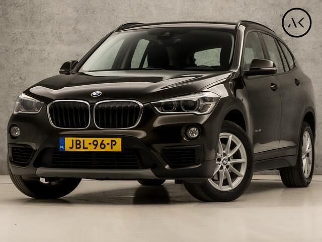 Bruin Gebruikt 2016 BMW X1 Executive SUV | € 18.945 (Eerlijke prijs) - Afbeelding 1/4