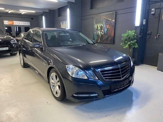 Grijs Gebruikt 2014 Mercedes E200 Avantgarde Sedan | € 12.490 (Eerlijke prijs) - Afbeelding 1/4