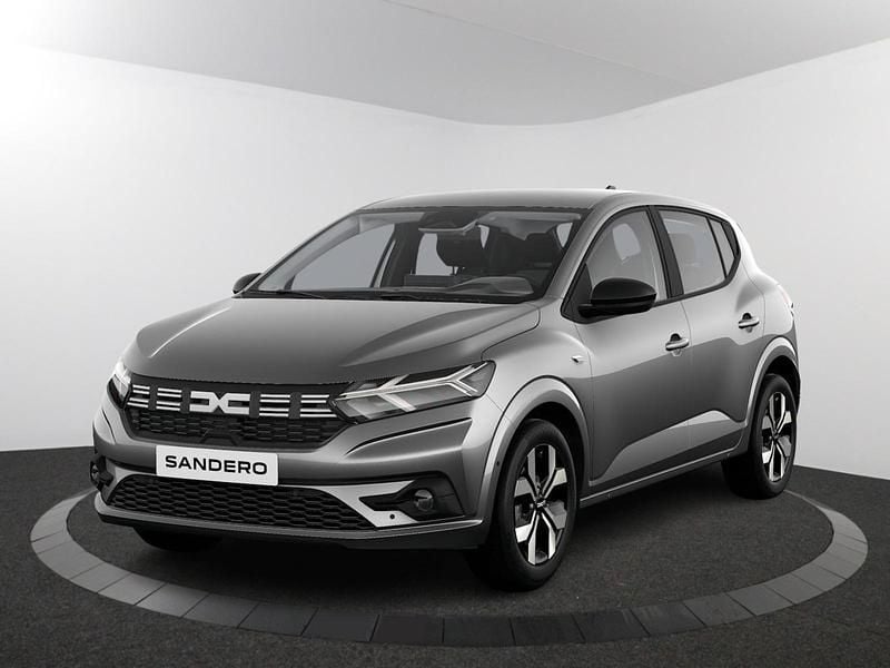 Gris schiste (grijs metallic) Nieuw 2025 Dacia Sandero Journey Hatchback | € 23.900 (Eerlijke prijs) - Afbeelding 1/4