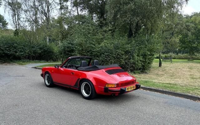 Rood Gebruikt 1984 Porsche 911 Cabriolet | € 63.745 - Afbeelding 1/4